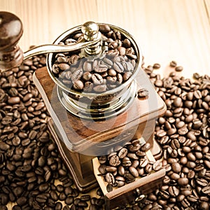 Manual coffee grinder with coffee beans