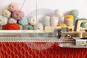 Manual knitting machine.