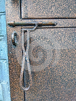 manual lock on the door with rusty pattern color