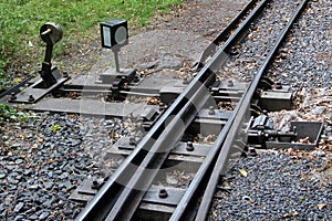 Manual railroad switch on a narrow-gauge railway