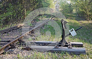 Manual railway arrow with a direction indicator and load.