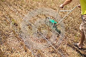 Manual seeder. Farming in drought zone. Growing with drip tape