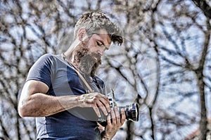 Manual settings. Photographer with beard and mustache. Man shooting photos. Content creator. Man bearded hipster
