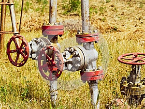 Manual shut-off valve on oil . Oil well wellhead equipment
