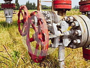 Manual shut-off valve on oil . Oil well wellhead equipment