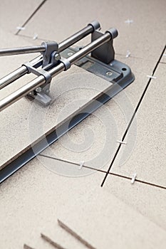 Manual tilecutter for cutting of ceramic granite