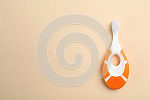 Manual toothbrush for child on color background