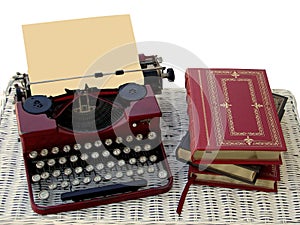 Manual typewriter and books