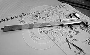 Manual vernier calliper on technical drawing photo
