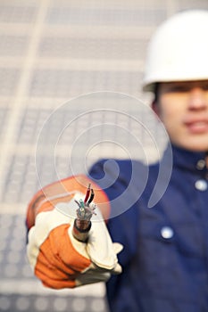 Manual worker with frayed wire