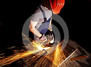 Manual worker with grinder photo