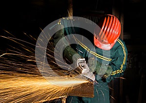 Manual worker with grinder