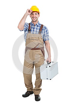 Manual worker with toolbox