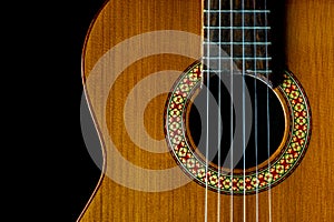 Manuel Rodriguez Model A classical guitar dark closeup, copy space