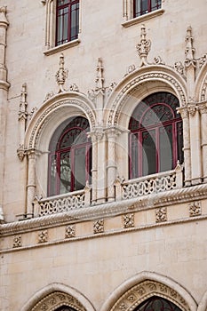 Manueline details in windows of the Rossio train station building, Lisbon PORTUGAL