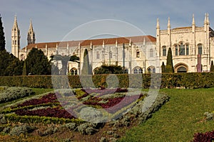 Manueline style facade and gardens. Monasteiro dos Jeronimos. Lisbon. Portugal