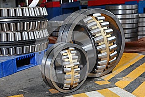 Manufacture of bearings in the factory.The chrome surface of products. Industrial theme. Production of bearings