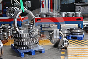 Manufacture of bearings in the factory.The chrome surface of products. Industrial theme. Production of bearings