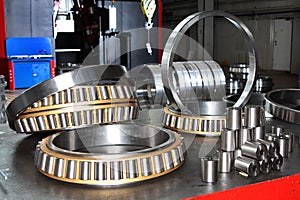 Manufacture of bearings in the factory.The chrome surface of products. Industrial theme. Production of bearings