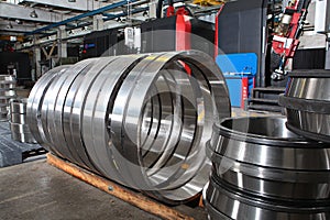 Manufacture of bearings in the factory.The chrome surface of products. Industrial theme. Production of bearings