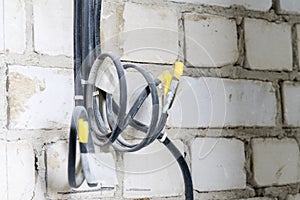 Manufacture of electrical wiring in a brick house