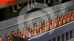 Manufacture of metal copper pipes on industrial CNC machine.