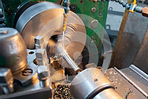 The manufacture of metal parts on a lathe, water-cooled