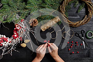 Manufacturer of Christmas decor with their own hands. Christmas wreath for the holiday. The new year celebration. Top