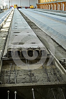 Manufacturing concrete slabs. reinforced concrete production