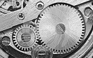 Manufacturing or industrial background. Concept Teamwork or idea Technology. Gears and cogs in clockwork. Macro. Black and white