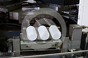 Manufacturing and printing on plastic bottles