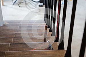 Manufacturing, repair of wooden stairs in a residential building