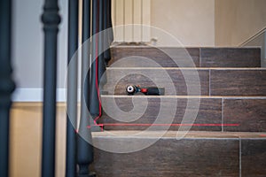 Manufacturing, repair of wooden stairs in a residential building