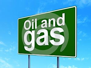 Manufacuring concept: Oil and Gas on road sign background