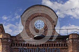 Manufaktura, famous centre located in former textile factory, main gate, Lodz, Poland