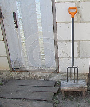 Manure fork with yellow  handle