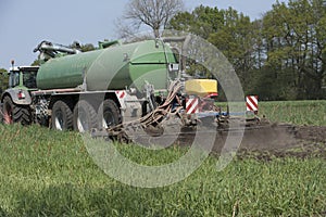 Agriculture, spreading manure. Germany, Europe