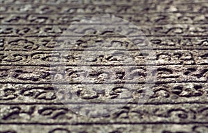 Manuscript on stone. Sinhalese language on 12th century wall of Hindu temple. Polonnaruwa, Sri Lanka.