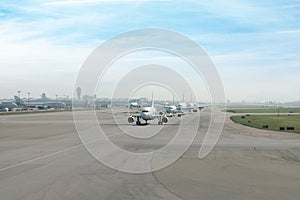 Many airplane prepare takes off from the runway in airport.