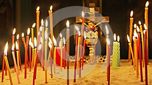 Many alight Memorial Church candles