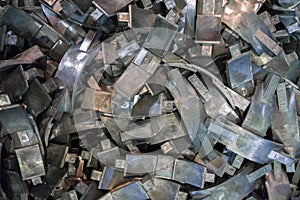 Many aluminium castings background view from above