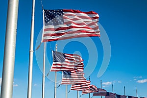 Many American Flags Waving at Washington Monument - Washington, D.C., USA