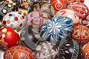 Many beautiful Easter eggs on background