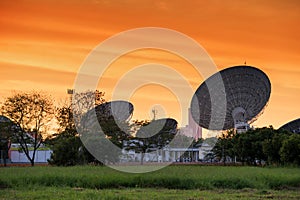 big satelite dishes with twilight sky