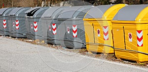 many bins for separate waste collection in the ecological area for the management material photo