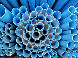 Many blue circle designs are made of plastic hose,