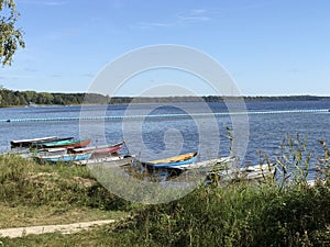 Many boats moored on the lake. Lake Naroch photo