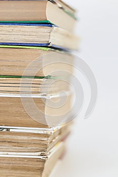 many books standing in a row isolated