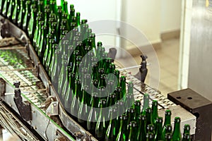 Many bottles on conveyor belt