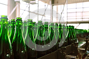 Many bottles on conveyor belt